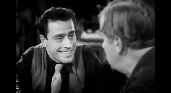 Jack LaRue as Jim Daggs, encouraging Jed Colby to clean out the Hayden family so both of them can profit as quickly as possible in To the Last Man (1933)
