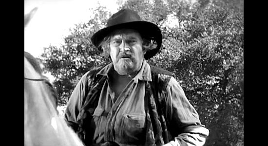 James Marcus as Col. Donovan, crooked boss of Lincoln County in Billy the Kid (1930)