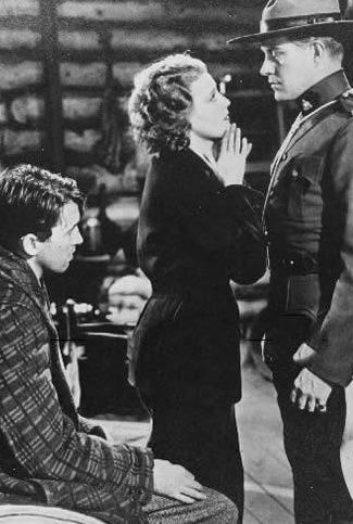 James Stewart as John Flower, Jeanette MacDonald as Maria de Flor and Nelson Eddy as Sgt. Bruce in Rose-Marie (1936)