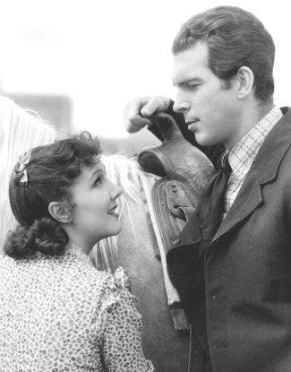 Jean Parker as Amanda Bailey and Fred MacMurray as Jim Hawkins in The Texas Rangers (1936)