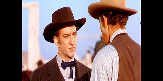 John Litel as Matt Cole, the cattle broker Jeff Surrett has killed in Dodge City (1939)