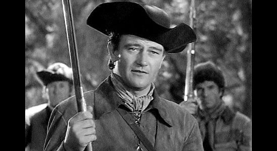 John Wayne as Jim Smith, making a stand with is followers to protect their valley in Allegheny Uprising (1939)