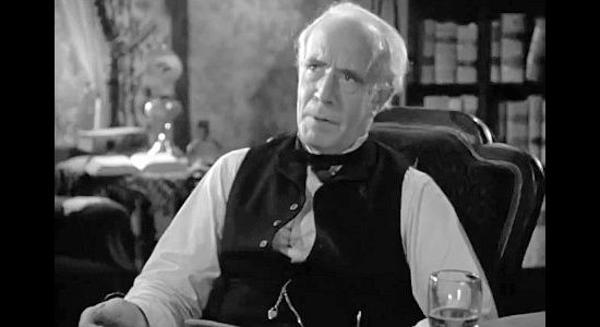 Lewis Stone as Jackson Douglas, Loretta's lawyer father in The Bad Man of Brimstone (1937)