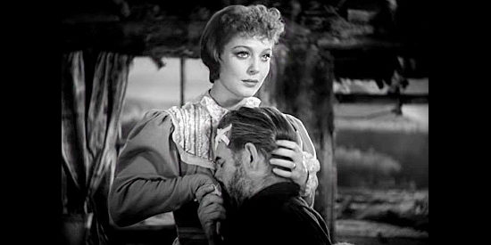 Loretta Young as Claire Blake, reunited with an injured prospector in Call of the Wild (1935)