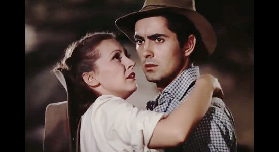 Nancy Kelly as Zee with Tyrone Powers as Jesse during a tense moment in Jesse James (1939)
