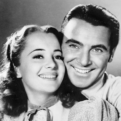 Olivia de Havilland and George Brent in Gold is Where You Find It (1938)