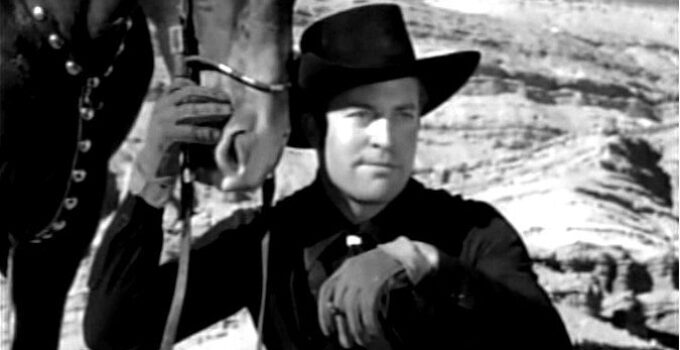 Chester Morris as Bob Sangster, ready to rob the sanctimonious town in which he grew up in Three Godfathers (1936)