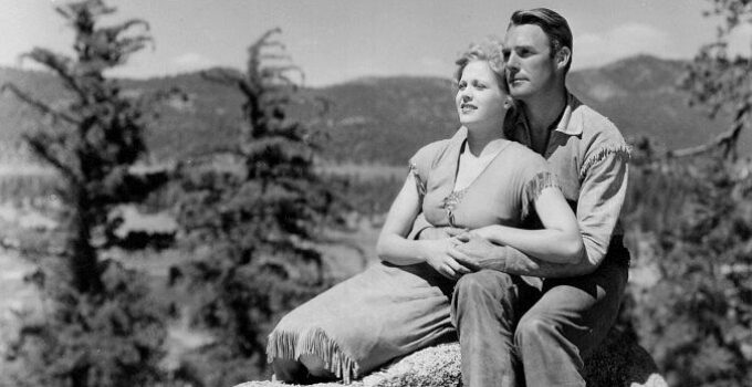 Esther Ralston as Ellen Colby and Randolph Scott as Lynn Hayden, hoping to put an end to a family feud in To the Last Man (1933)