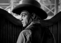 James Cagney as The Oklahoma Kid, facing the prospect of trouble in a saloon in The Oklahoma Kid (1939)