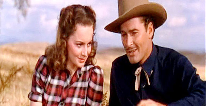 Olivia de Havilland as Abbie Irving and Errol Flynn as Wade Hatton in Dodge City (1939)