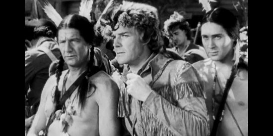 Randolph Scott as Hawkeye with Robert Barrat as Chingachgook and Philip Reed as Uncas, wondering whether Magua can be trusted in Last of the Mohicans (1936)