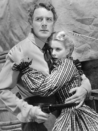 Randolph Scott as Kirk Jordan with Joan Bennett as Ivy Preston in The Texans (1938)