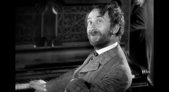 Roscoe Ates as Jesse Rickey, the man who becomes the longtime printer for the newspaper Yancey founds in Osage in Cimarron (1931)