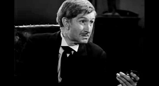 Russell Simpson as Judge R.W. Williams, trying to convince Frame Johnson to pin on a badge again in Law and Order (1932)