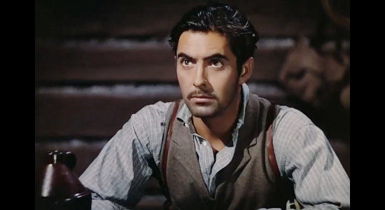Tyrone Power as Jesse James, working on plans for his next holdup in Jesse James (1939)
