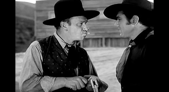 Wallace Beery as Pat Garrett and Johnny Mack Brown as Billy, squaring off in Billy the Kid (1930)