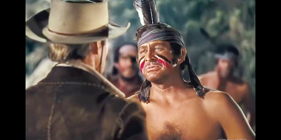 Barton MacLane as Jack Slade, decked out as an Indian to harass the telegraph line in Western Union (1941)