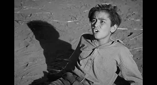 Charles Bates as young Adam Callum, fighting with Jeb again in Pursued (1947)