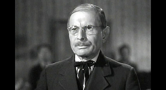 Charles Halton as Jonathan Stuve, the attorney wrapped up in the claim jumping in The Spoilers (1942)