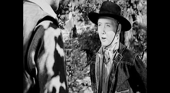 Claude Jarman Jr. as Steve Phillips, at odds with his brother over Clay's treatment of Mary Wells in Roughshod (1949)