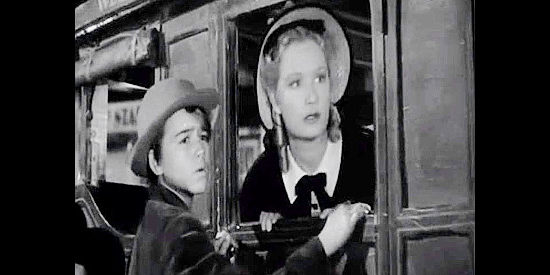 Dickie Jones as young Cobby Gill, friend of Julia Hayne (Miriam Hopkins) in Virginia City (1940)