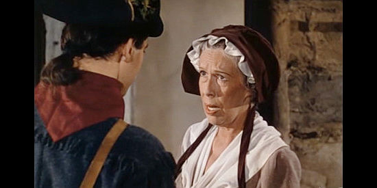 Edna May Oliver as Mrs. McKlenner, concerned as Gilbert Martin heads off to fight in Drums Along the Mohawk (1939)