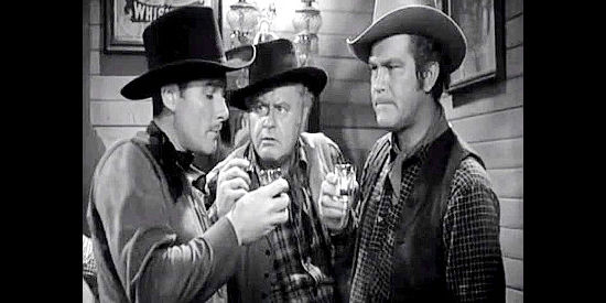 Errol Flynn as Kerry Bradford with his sidekicks, Alan Hale as Moose Swenson and Guinn Williams as Marblehead in Virginia City (1940)