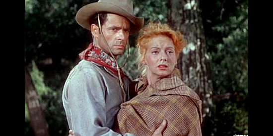 Evelyn Keyes as Hannah Brockway with Ben Denbow (Larry Parks), the outlaw she runs off with in Renegades (1946)