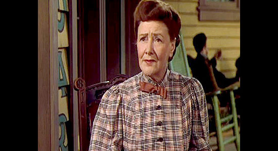 Fay Holden as Emmy Dansing, Bill's wife, hoping Whispering Smith can talk sense into Murray Sinclair in Whispering Smith (1948)