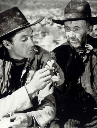 Gary Cooper as Cole Harden and Walter Brennan as Judge Roy Bean in The Westerner (1940)