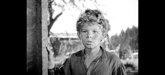 Gary Gray as young Davey, about to be scolded for not doing his lessons in Rachel and the Stranger (1948)