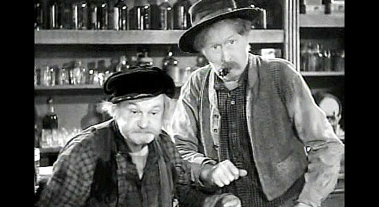 George Cleveland as Banty and Russell Simpson as Flapjack Sims, old-timers on the verge of losing their mine to claim jumpers in The Spoilers (1942)