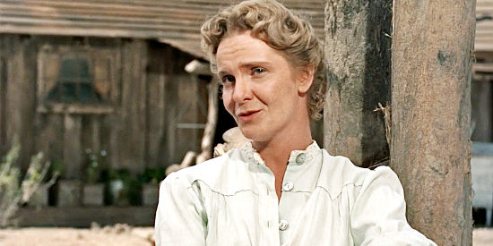 Geraldine Page as Angie Lowe, talking to Hondo about his time with the Apache in Hondo (1953)