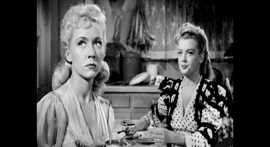 Gloria Grahame as Mary Wells and Myrna Dell as Helen Carter, upset with Steve's decision to leave them with the Wyatts in Roughshod (1949)