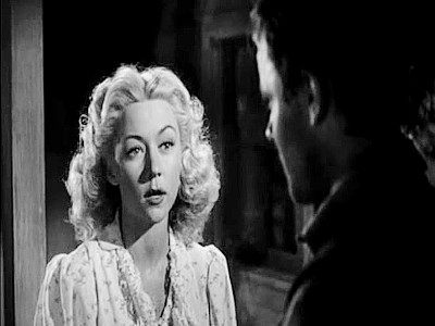 Gloria Grahame as Mary Wells, doing her best to charm Clay Phillips into getting her way in Roughshod (1949)