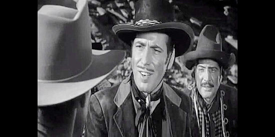 Humphrey Bogart as John Murrell, a bandit planning to steal the Rebel gold in Virginia City (1940)