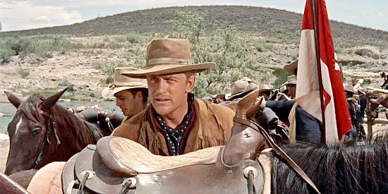 James Arness as Lennie, the cavalry scout who knows who killed Mr. Lowe in Hondo (1953)