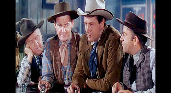 Joel McCrea as The Virginian, sharing a drink with friends before a showdown with Trampas in The Virginian (1946)