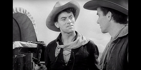 John Ireland as Cherry Valance, eager to show off his gun skills to Matt Garth (Montgomery Clift) in Red River (1948)