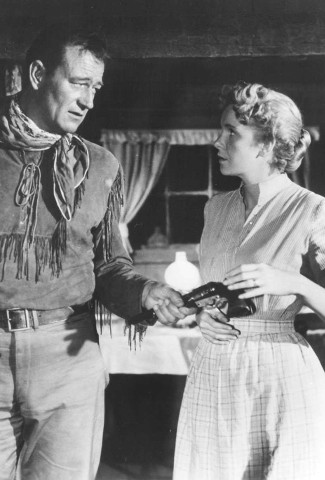 John Wayne as Hondo Lane and Geraldine Page as Angie Lowe in Hondo ...