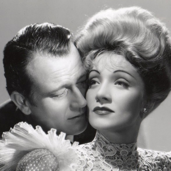 John Wayne as Roy Glennister and Marlene Dietrich as Cherry Malotte in The Spoilers (1942)