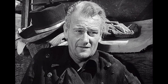 John Wayne as Tom Dunson, determined to reclaim his herd from the young man he raisedin Red River (1948)
