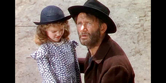 Ludwig Donath as Jackorski, with his ailing daughter Janina (Eilene Janssen) in Renegades (1946)