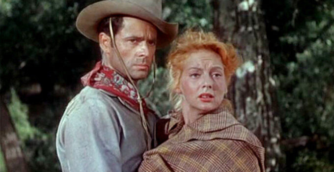 Evelyn Keyes as Hannah Brockway with Ben Denbow (Larry Parks), the outlaw she runs off with in Renegades (1946)