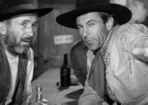 Walter Brennan as Judge Roy Bean listening to a description of Lilly Langtry from Cole Harden (Gary Cooper) in The Westerner (1940)