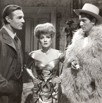Randolph Scott as McNamara, Marlene Dietrich as Cherry Malotte and John Wayne as Roy Glennister in The Spoilers (1942)