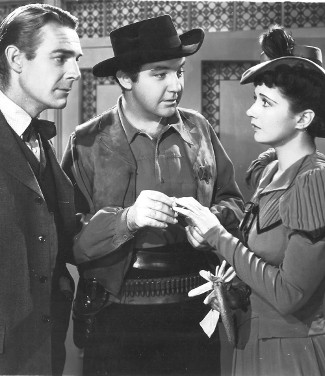 Randolph Scott as Tod Jackson, Broderick Crawford as Bob Dalton and Kay Francis as Juie King in When the Daltons Rode (1940)