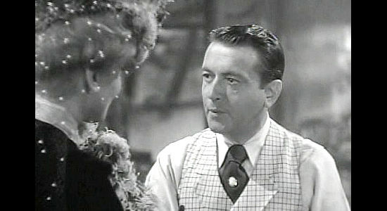 Richard Barthelmess as Bronco, the saloon operator in love with Cherry Malotte in The Spoilers (1942)