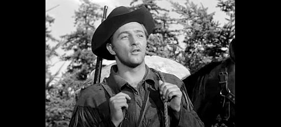 Robert Mitchum as Jim Fairways, wild and woodsy and dropping by the Harveys for his annual visit in Rachel and the Stranger (1948)
