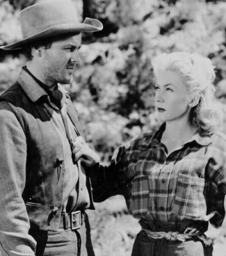 Robert Sterling as Clay Phillips with Gloria Grahame as Mary Wells in Roughshod (1949) 